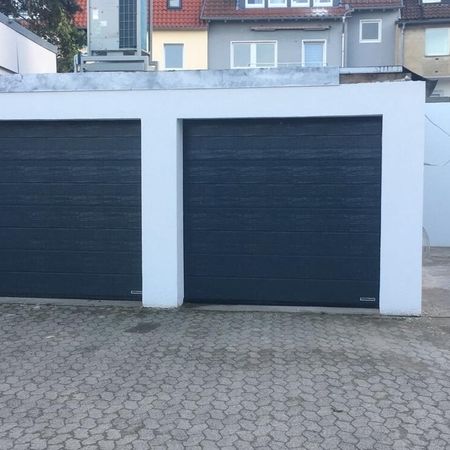 Hörmann RenoMatic Light, handbedient, RAL 7016 Anthrazitgrau, Mittelsicke Woodgrain