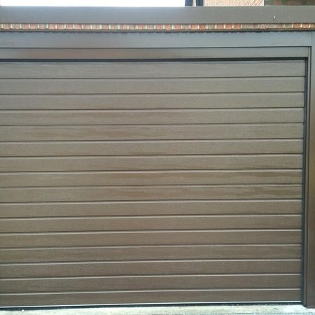 Teckentrup Garagen-Sektionaltor ISO40 Sicke woodgrain RAL 8014 sephiabraun mit Blendrahmen für Fertiggarage