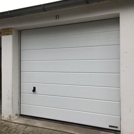 Hörmann RenoMatic Light, handbedient, RAL 9016 Verkehrsweiß, Mittelsicke Woodgrain