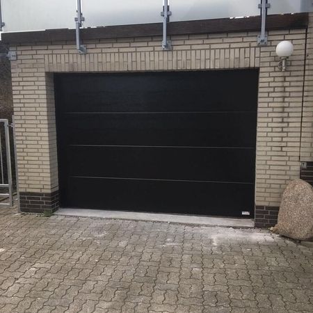 ConDoor, ohne Sicke, Holzstruktur, RAL 8022, Schwarzbraun